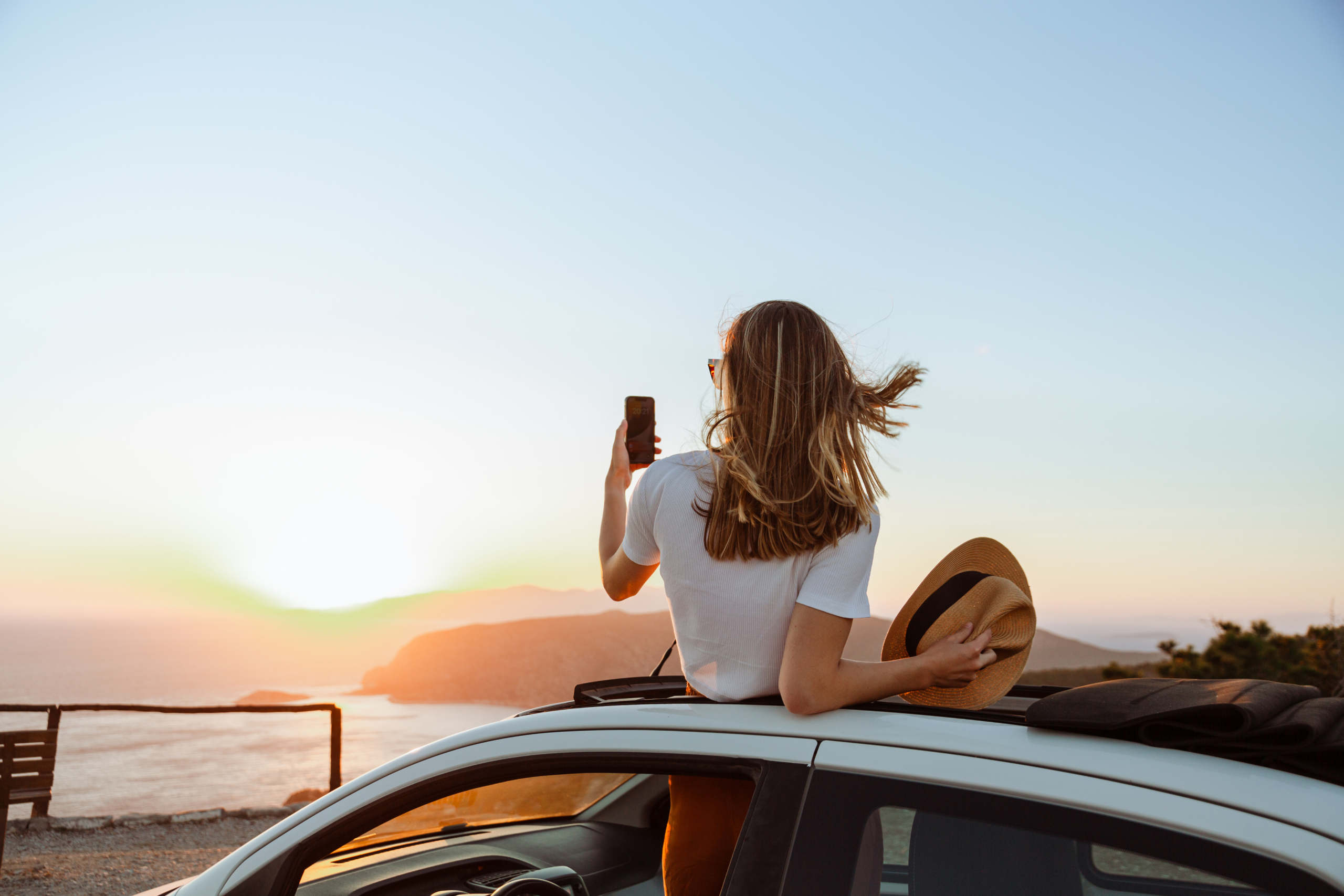 A traveler enjoying a scenic drive
